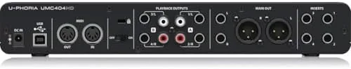The UMC404HD next to a two input interface and an eight input interface