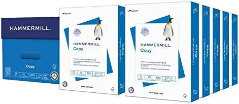 A stacked case of Hammermill 20 lb copy paper next to a laser printer