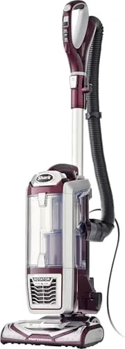 The Shark NV752 TruePet upright vacuum standing in a living room
