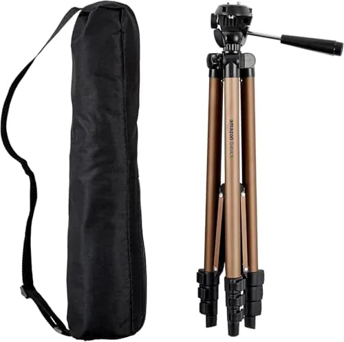 The Amazon Basics 50-inch tripod folded and leaning against a backpack
