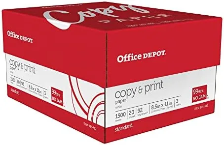 A ream of Office Depot bright white copy paper on a desk with a printer nearby
