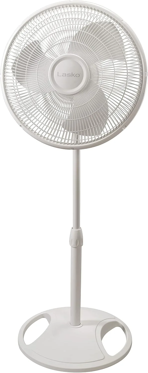 Lasko 2520 pedestal fan in white standing at full height in a living room
