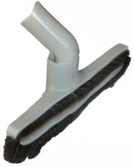 The horse hair brush next to the stock vacuum floor head