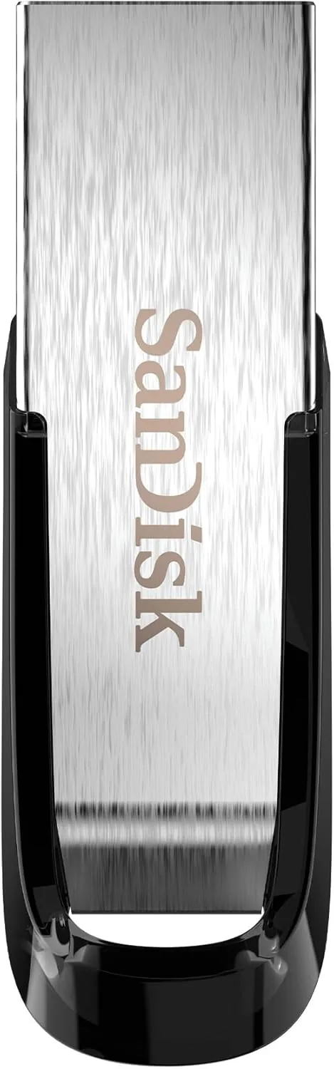 The silver SanDisk Ultra Flair 64GB flash drive standing on a desk