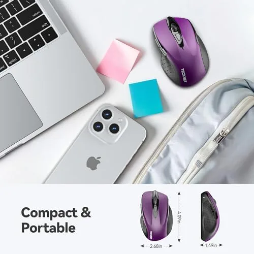 The TECKNET mouse held in a right hand showing the ergonomic grip