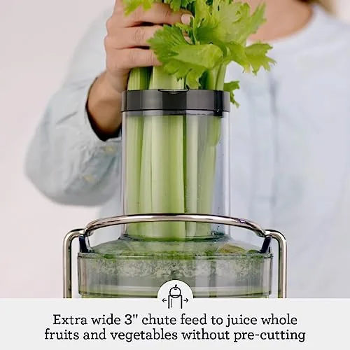 The Breville juicer next to a masticating juicer for comparison