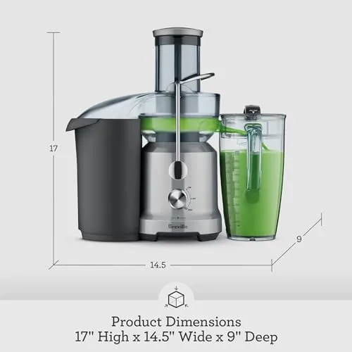 The filled 70 ounce juice jug and a fresh glass on the counter