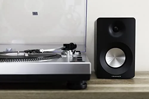 The Crosley C100A next to a suitcase style record player for comparison