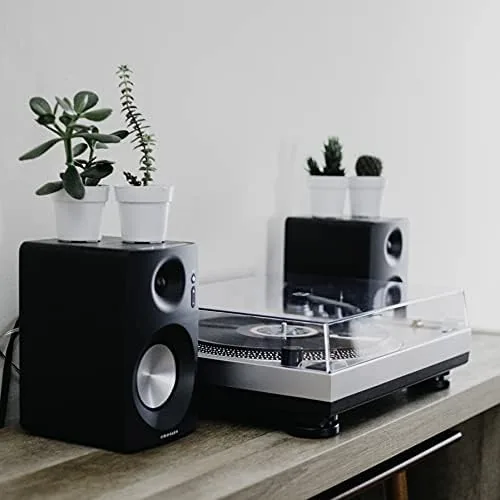 A listening room setup with the C100A connected to a receiver and speakers