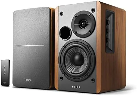 The wood finished Edifier R1280T speakers flanking a computer monitor