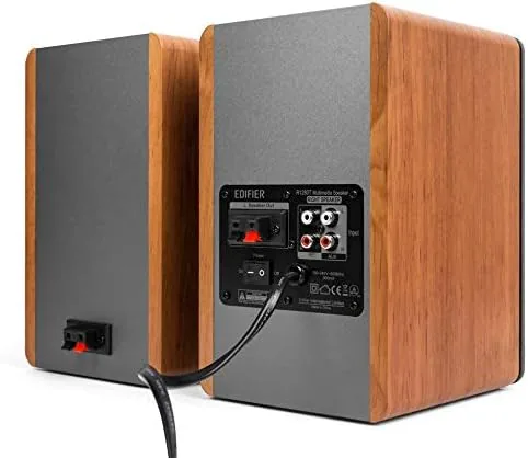 A close up of the R1280T wood finish and front grille