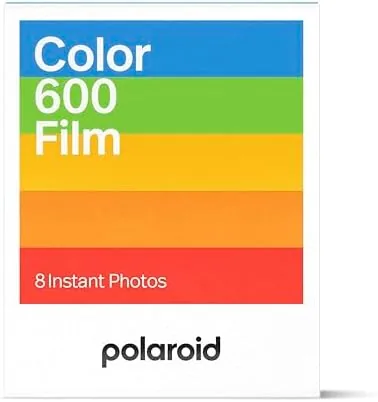 Fresh Polaroid print emerging from a 600 series camera