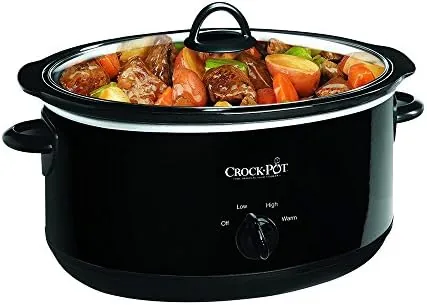 Slow cooked chicken and vegetables lifted from the stoneware insert