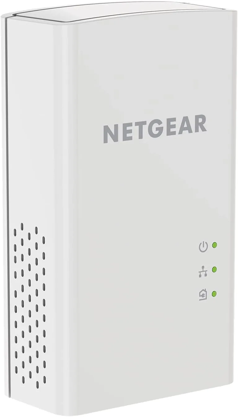 The NETGEAR PL1000 kit next to a budget 500 powerline kit and a mesh Wi-Fi node
