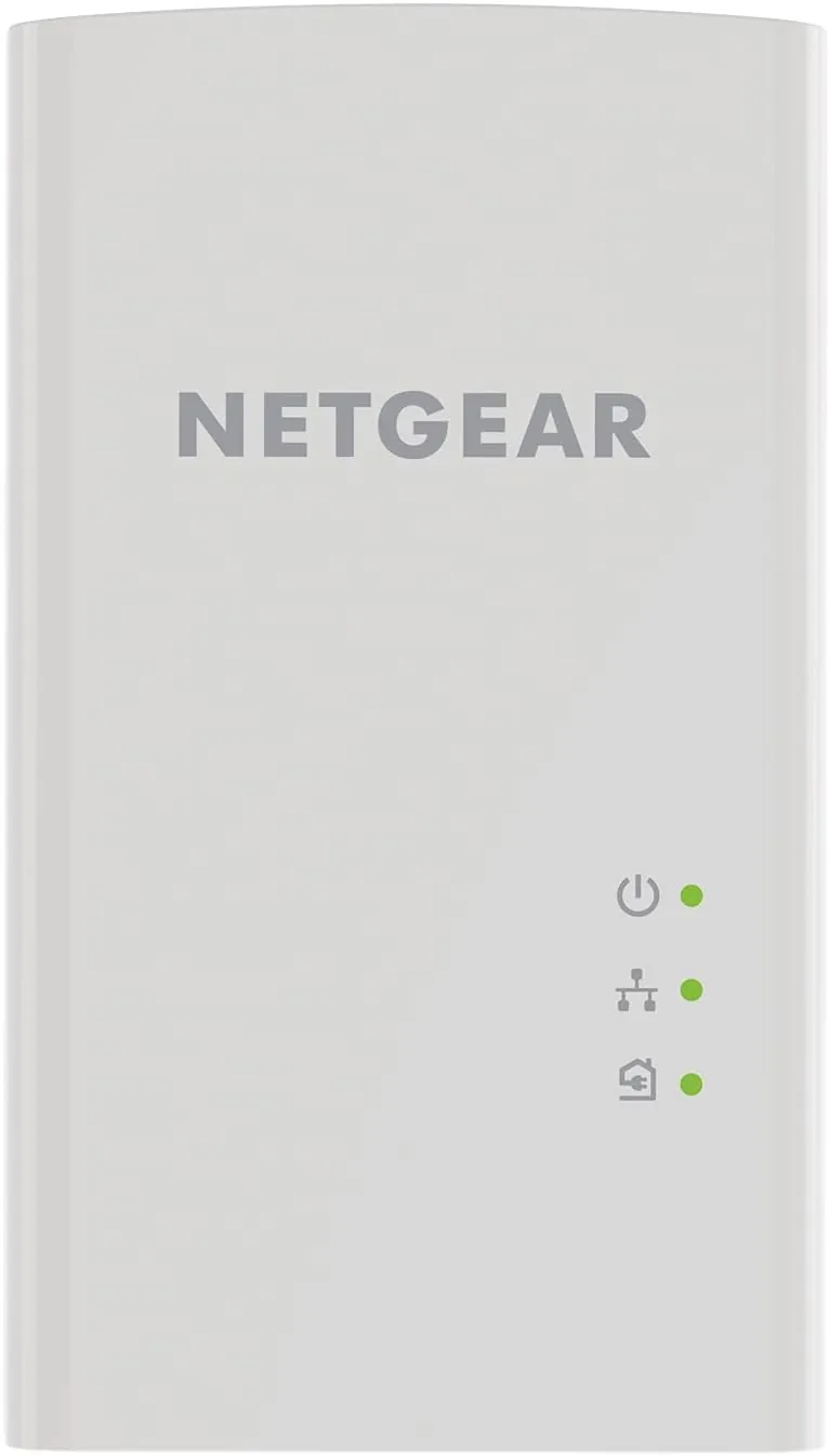 The NETGEAR PL1000 adapters in place with indicator lights showing a solid link