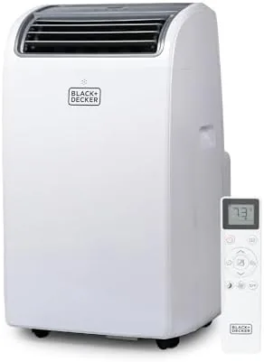 The BLACK+DECKER portable air conditioner in a living room corner