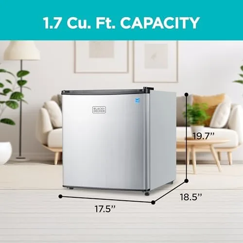 The open fridge showing the chiller compartment and adjustable shelf