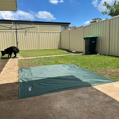 The tarp used as a sunshade over a camp table in daylight