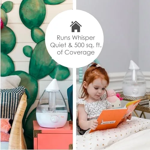 The Crane humidifier running in a nursery with a baby crib in view