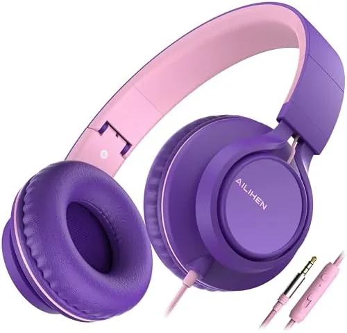 The headphones worn by a child watching a tablet on a couch