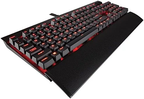 Corsair K70 LUX mechanical keyboard with red backlighting on a desk