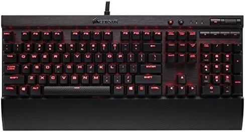 Hands typing rapidly on the Corsair K70 LUX keyboard