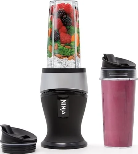 The Ninja Fit personal blender with a 16 ounce cup of smoothie on top