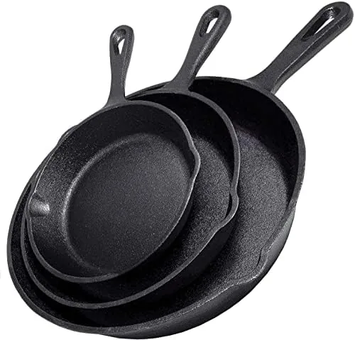 The three cast iron skillets in 10, 8, and 6.25 inch sizes arranged together