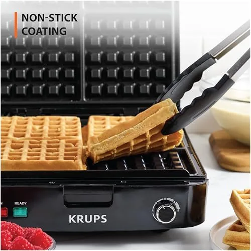 Batter being poured into the four waffle wells