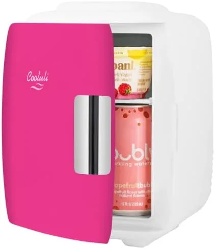 Skincare bottles and serums arranged inside the open Cooluli fridge
