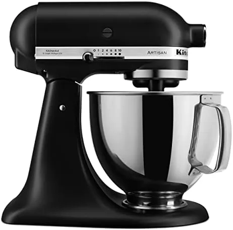 The black matte KitchenAid Artisan stand mixer on a kitchen counter