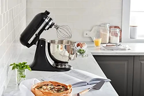 The Artisan mixer next to a larger bowl lift model