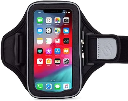 A runner wearing the Entropy E8 armband on the left arm during an outdoor run