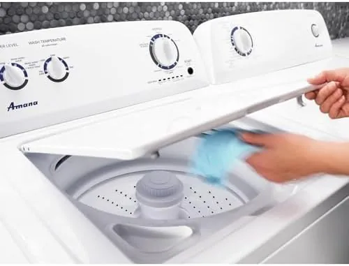 Close-up of the Amana washer control dial showing the cycle options and water level settings
