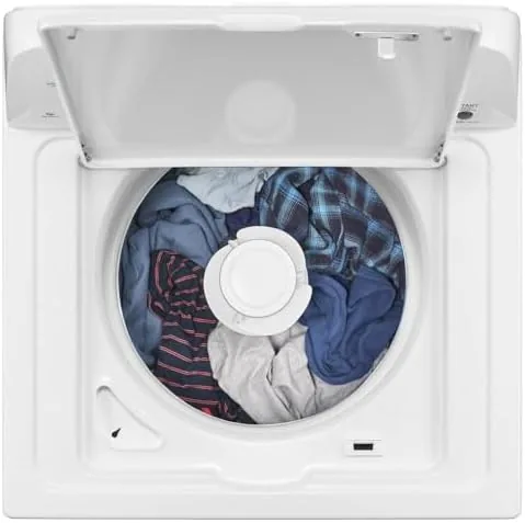 The Amana washer drum with the agitator visible and a full load of towels inside
