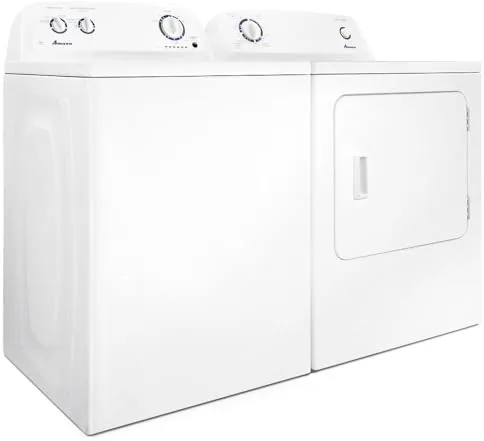The Amana washer with the lid open showing a clean load of laundry ready to remove