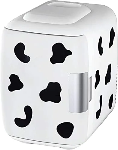 The Cooluli 4L skincare mini fridge in cow print with the lid open showing bottles inside