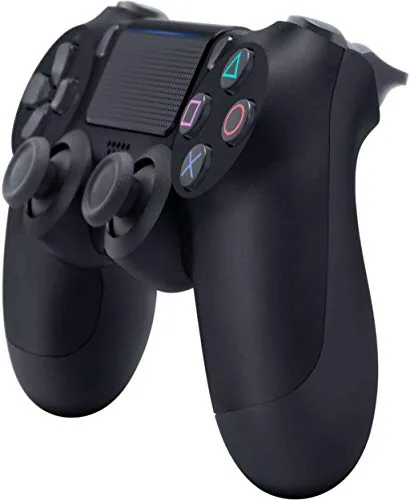 DualShock 4 wireless controller in Jet Black on a desk
