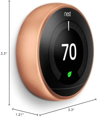 Living room scene with the Nest thermostat glowing on the wall at dusk