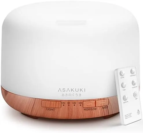 ASAKUKI 500ml essential oil diffuser with yellow finish on a nightstand