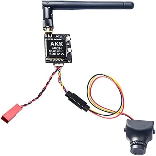 The AKK KC04 FPV camera and transmitter unit sitting on a workbench