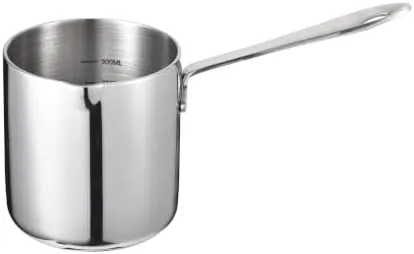 The IMEEA 10oz stainless steel butter warmer sitting on a stove burner