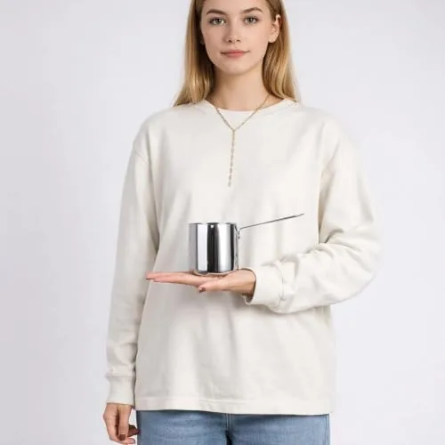 The IMEEA butter warmer clean and hanging with other small kitchen tools