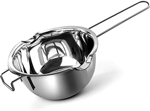 The stainless steel double boiler pot sitting over a pot of simmering water