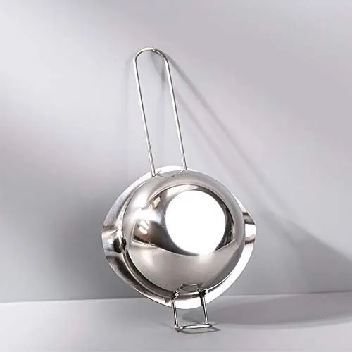 Close up of the brushed stainless steel surface of the melting pot