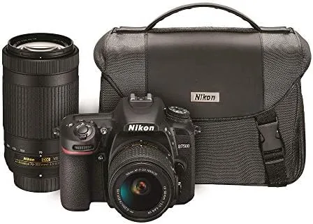 The Nikon D7500 with battery and memory card laid out alongside shooting accessories