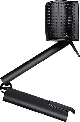 The C922 webcam sitting on a desk with its clip folded flat