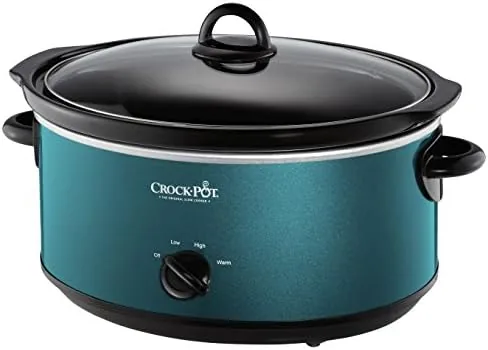 The Crock-Pot with the stoneware insert being washed with the glass lid nearby