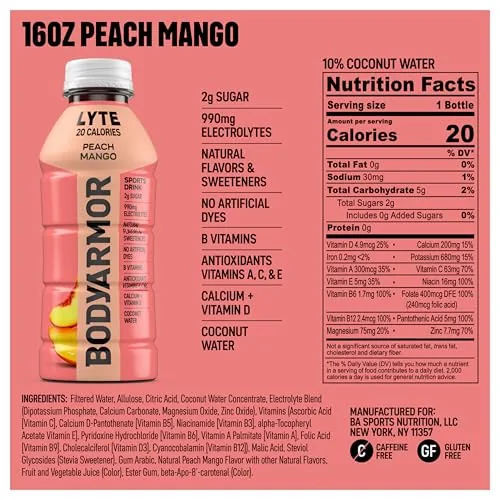 A glass of BODYARMOR LYTE Peach Mango poured from the bottle showing the drink color