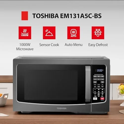 Close up of the control panel of the Toshiba microwave showing the dial and buttons